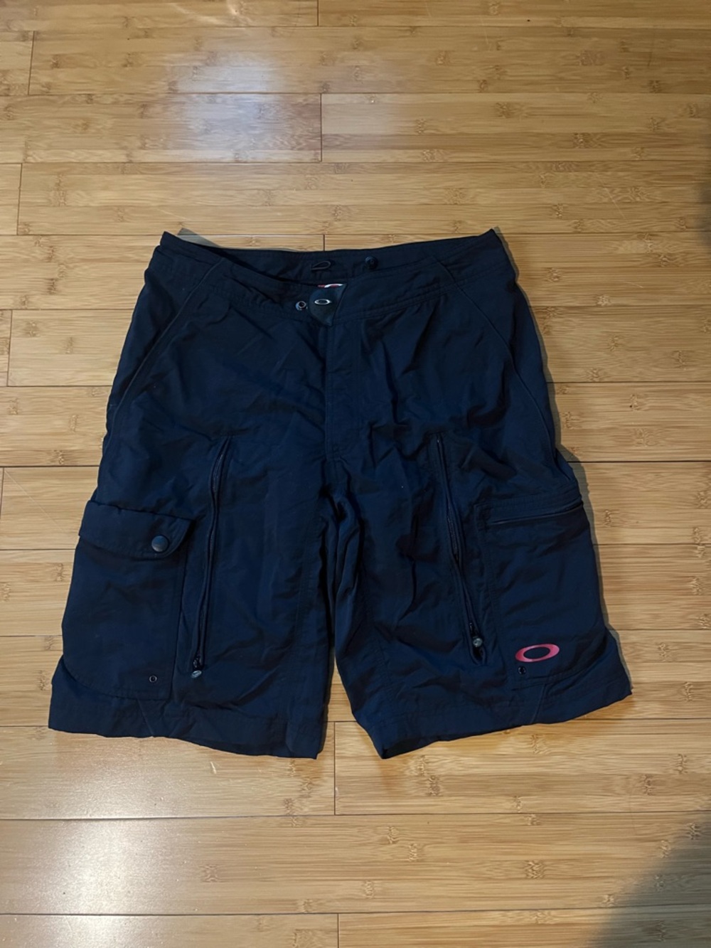 Oakley software Black Cargo Shorts with red Logo